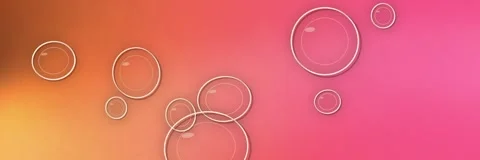Transparent glass bubbles floating over a coral, orange and hot pink gradient, Stock Footage 340156541