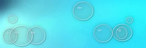 Transparent glass bubbles floating over a bright cyan and aqua gradient, website Stock Footage 340156708