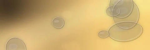 Transparent glass circles floating over a gold and amber gradient, website Stock Footage 340156389
