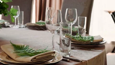 Transparent glasses are on the table Stock Footage 135828921