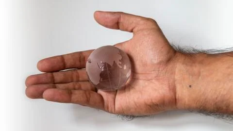 Transparent Globe in the hand Stock Photos