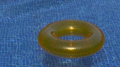 Transparent golden pool float drifting across calm blue water. Minimal summer Stock-Footage 345651546