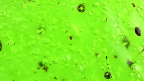 Transparent green liquid gel background, cosmetics product with bubbles tex.. Stock Footage 256164181
