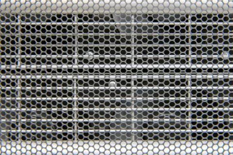 Transparent grid background with round cells to protect computer hardware Foto stock