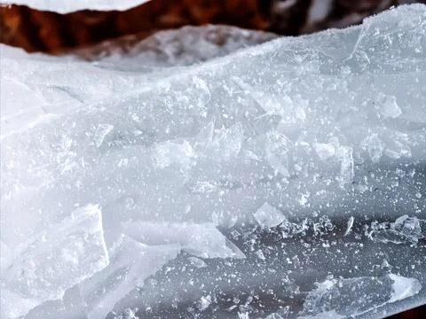 Transparent Ice Layer with Frozen Air Bubbles Macro Stock Photos