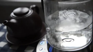 Transparent kettle with boiling water Stock Footage 85909963