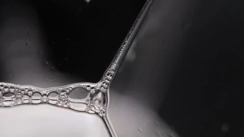 Transparent liquid, bubbles of thick liquid, water pattern Stock Footage 295887998