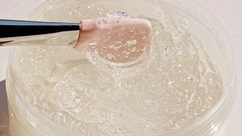 Transparent liquid gel background, clear serum texture. Motion of the beauty Stock-Footage 220941262