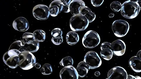 Transparent Liquid Spheres with White Highlights on Black Background 4K Stock-Footage 332135430