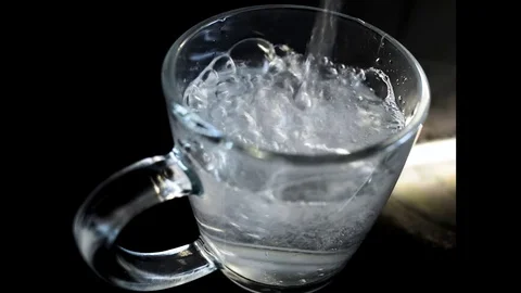 Transparent mug with water Stock Footage 78189794