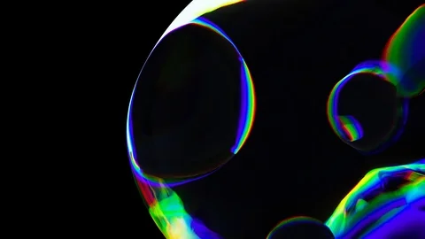 Transparent Multicolored Glass Bubbles in Dark Space Stock Footage 121578053