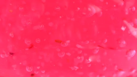 Transparent pink liquid gel background, cosmetics product with bubbles text.. Stock Footage 256164183