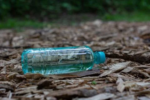 A transparent plastic bottle on a ground  Stock Photos