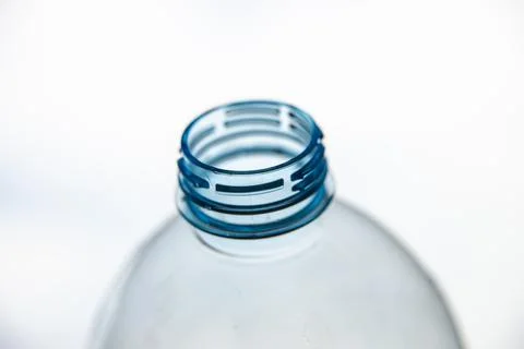 Transparent plastic bottles, on a clear surface. Stock Photos