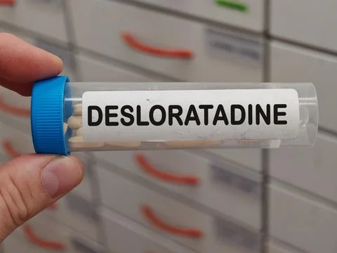 Transparent plastic Box of DESLORATADINE second generation antihistamine for Stock Photos