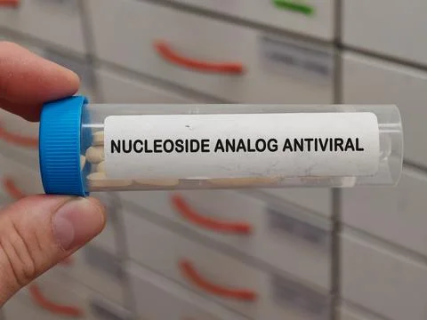 Transparent plastic box of NUCLEOSIDE ANALOG ANTIVIRAL antiviral drug class for Stock Photos