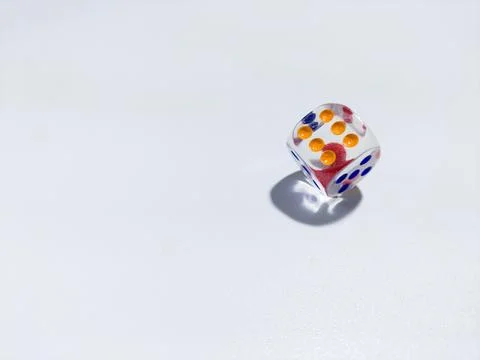 Transparent plastic dice on white background Stock Photos