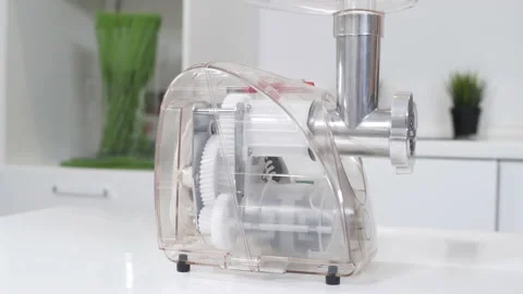 Transparent plastic meat grinder for minced meat per minute, make sausages Stock Footage 130243153