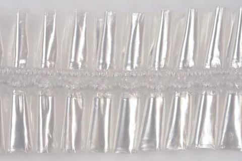 Transparent plastic pleated bouffant cap texture background Stock Photos