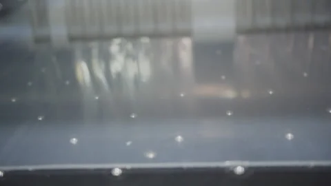 Transparent plastic sheet moves along conveyor on machine Stock Footage 230037557