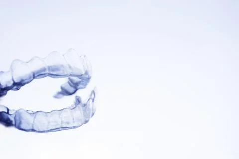 Transparent plastic splint for dental alignment Stock Photos