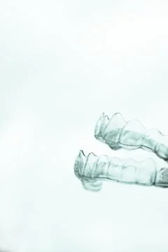 Transparent plastic splint for dental alignment Stock Photos