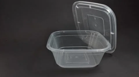 Transparent Plastic Storage Box in square shape, black background. Foto stock