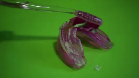 Transparent Plastic Toothbrush with Toothpaste Cleaning Silicone Dental Retainer Stock Footage 321530125