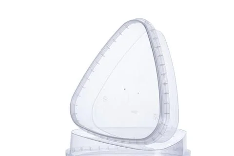 Transparent plastic triangular container with transparent lid - 500 ml, tri.. Stock Photos