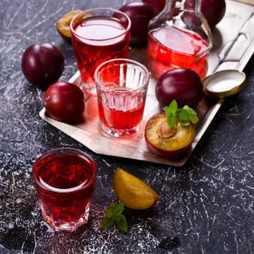 Transparent plum drink Stock Photos