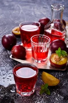 Transparent plum drink Stock Photos