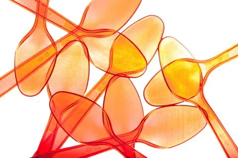 Transparent red spoons Stock Photos