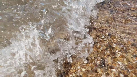Transparent Ripples On The Surface Of The Sea With Small Pebbles On The Bottom.  Stock Footage 264535564
