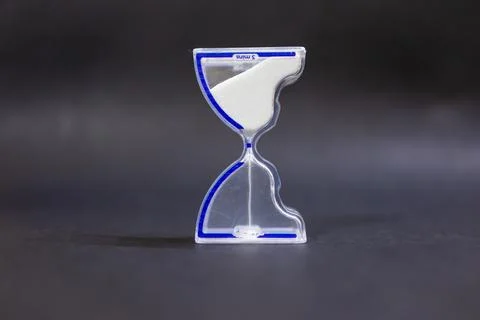 Transparent Sand Time Management Tool On Black Background Stock Photos