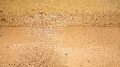 Transparent sea waves running to sandy shore. Video stock 109120652