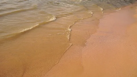 Transparent sea waves running to sandy shore. Stock Footage 109123339