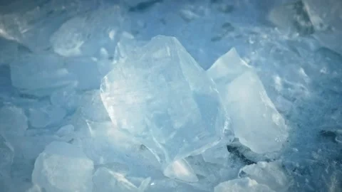 Transparent shards of ice that look like a diamond through which light passes Video stock 257762080