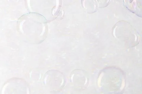 Transparent soap bubble pattern on a gray wallpaper background Stock Photos