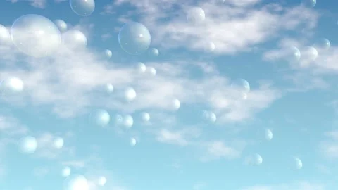 Transparent Soap Bubbles Floating Across a Bright Blue Cloudy Sky Stock Footage 335608295