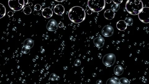 Transparent soap bubbles floating upward against a solid black background Stock-Footage 346213587