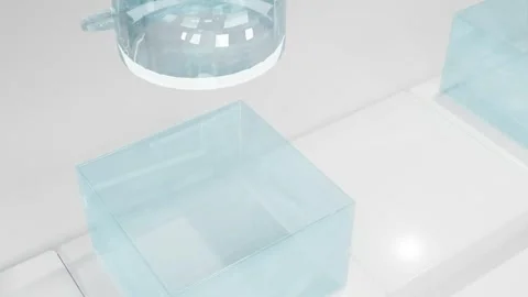 Transparent spheres fall into transparent boxes on a conveyor belt. abstract thr Stock Footage 255820734