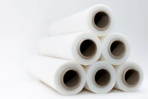 Transparent stretch film in rolls on a white background Stock Photos