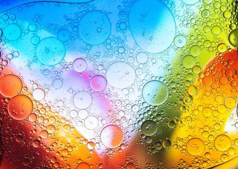 Transparent surface on colorful background Stock Photos