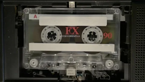 Transparent tape cassette playing A-Side Stock-Footage 196860418