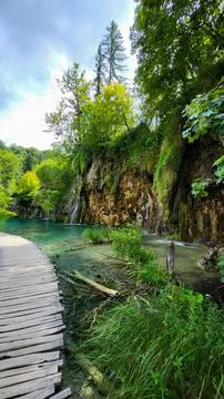Transparent Turquoise Colored Waters of the Lake Are Having Ripples. Many Sma 库存照片