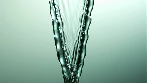 Transparent water sheet falling on green background Stock Footage 327123460