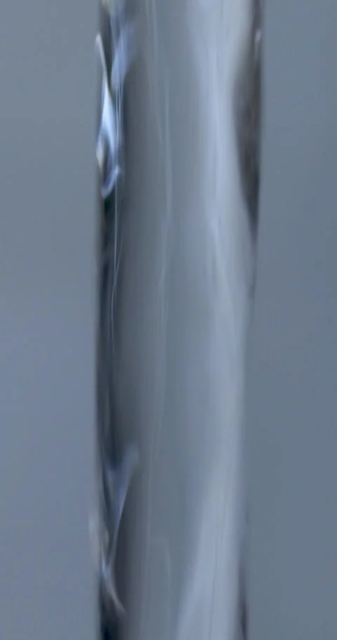 Transparent water stream on off macro Stock Footage 330677201