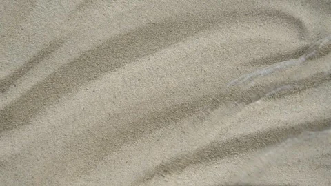Transparent water surface ripples texture motion, waves, splash, sand background Stockbeeldmateriaal 270451730