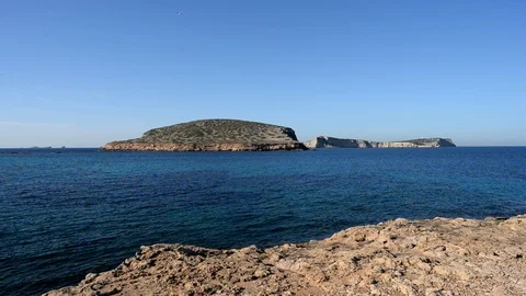 Transparent waters in the cala compte, Ibiza Video stock 87145515