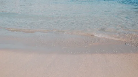 Transparent waves washing clean beach Stock Footage 123192147